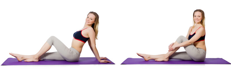 Obraz premium Young female doing exercises on white