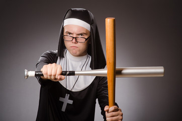 Funny man wearing nun clothing