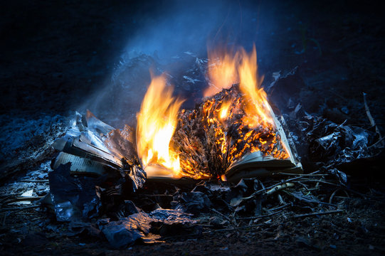 Combustion book on pyre of brushwood