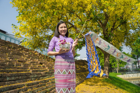 Young Thai girl at temple in songkran festival ,Chiangmai Thailand.