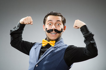 Funny man against dark background