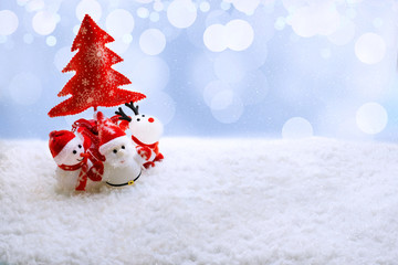 New Year background. Santa, Snowman and Deer toys under a plush