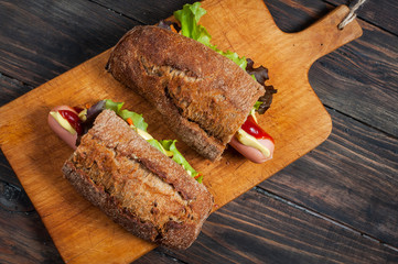 Homemade Hot Dog on rustic wooden background