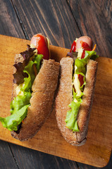 Homemade Hot Dog on rustic wooden background
