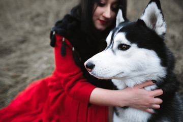 good hostess hugs her dog