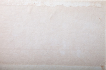 Surface of old paper for textured background. Focus on the centr