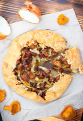 Open pie with chanterelles, top view