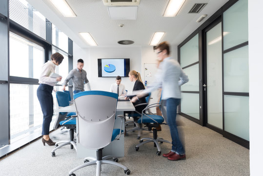 Business People Group Entering Meeting Room, Motion Blur