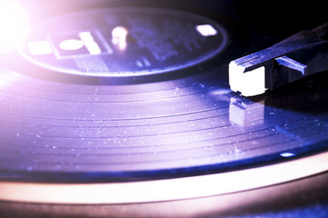 Segment of vinyl record with label showing the texture of the grooves, retro look , with copyspace
