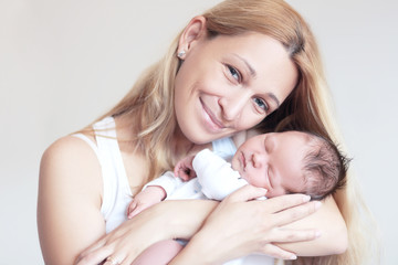 Obraz na płótnie Canvas Mother and her Newborn Baby