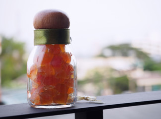 Dried papaya in a bottle