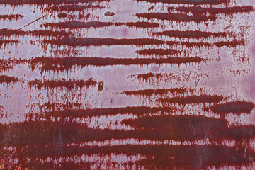 Red metallic rusted surface as a textured background
