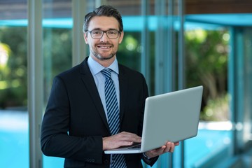 Businessman using laptop 