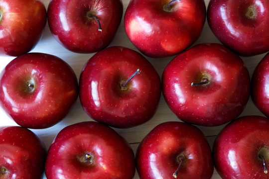 Background of red delicious ripe apples