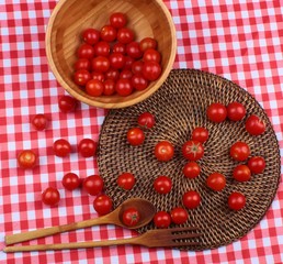 Cherry Tomato on a wooden background / A bowl of cherry tomato & cherry tomato on a wooden background