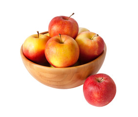 Wooden bowl with apples isolated on white