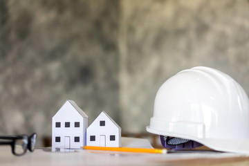 business, architecture plans with helmet and drawing tools