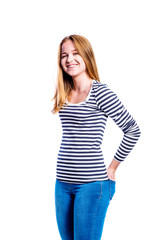 Obraz premium Girl in jeans and t-shirt, young woman, studio shot