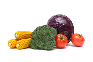 broccoli, tomatoes, corn and red cabbage on a white background