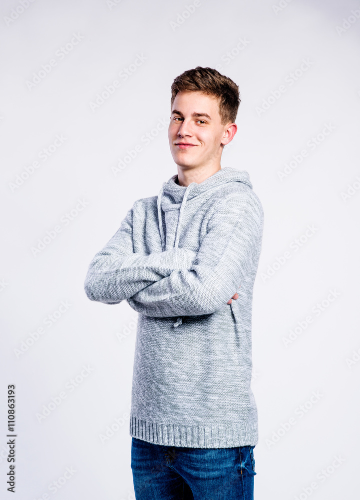 Poster Boy in jeans and t-shirt, young man, studio shot