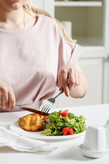 Obraz na płótnie Canvas Fried beef with salad on white table. Stock image