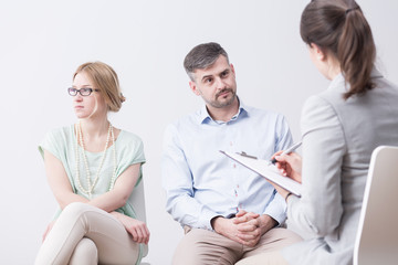 Young woman and man on psychotherapy