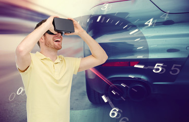 man in virtual reality headset and car racing game