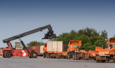 Forklift handling container box loading