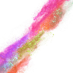 Explosion of colored powder on white background