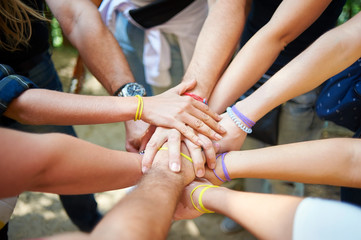 People put a hand in the center, in a sign of team spirit