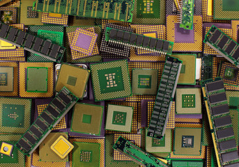 Pile of old CPU chips, obsolete computer processors and memory modules