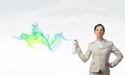 Woman use paint spray