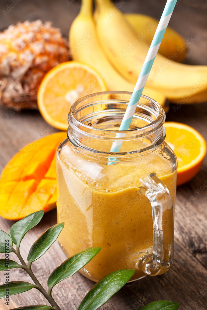 Wall mural smoothie with tropical fruits