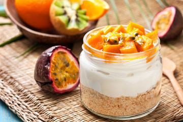 not baked cheesecake in a  jar with mango and passionfruit