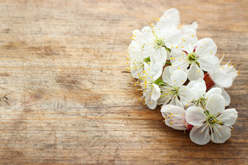 White flowers on wooden background