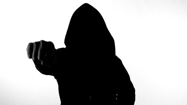anonymous hacker with mask talking to camera 4k