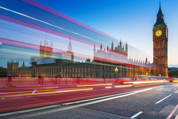 Fototapeta na wymiar London scenery at Westminter bridge with Big Ben and blurred red