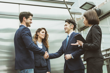 business team shaking hand