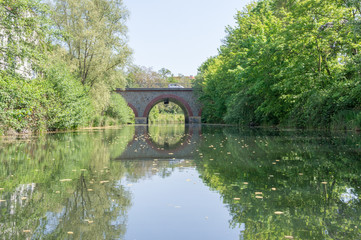 Fototapeta na wymiar Bridge and the reflections of it