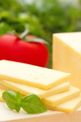 Cheese with basil and vegetables