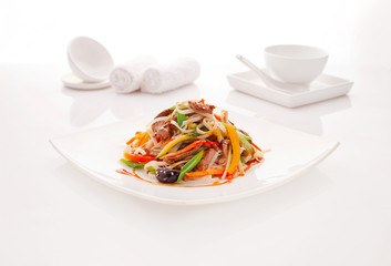 Fried noodles udon with beef and vegetables