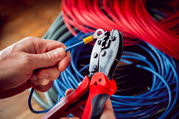 Electrical equipment. Electricity cable and crimper.