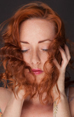 Beautiful Woman With Wavy Red Hair