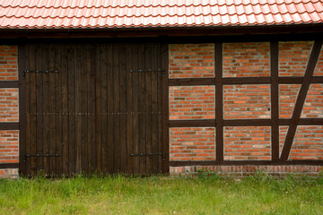 Prussian wall and wooden gate.