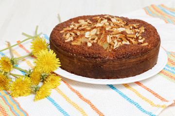 Pie with pears, peanuts and cookies-sticks