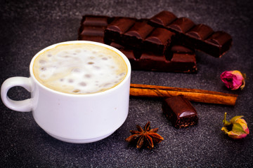 Coffee with milk, cappuccino in a blue retro cup
