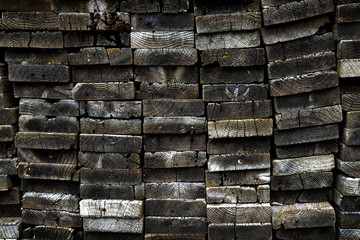 Old Wooden Boards Stacked in Heap