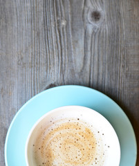 Cappuccino on wooden background