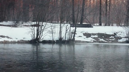 Winter river. Panorama of winter river with fog. Winter background. River in winter park. Mist over water. River bank covered with snow. Snowy winter park. Fog over cold river - Powered by Adobe