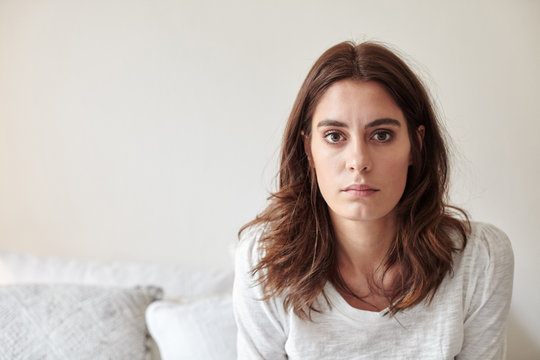 Portrait of young woman staring at camera